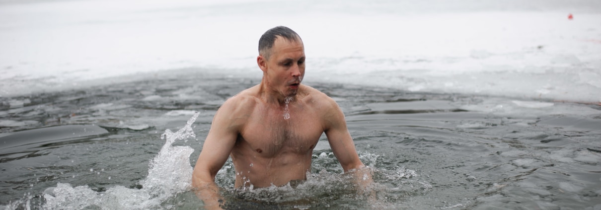 man doing ice baths