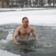 man doing ice baths